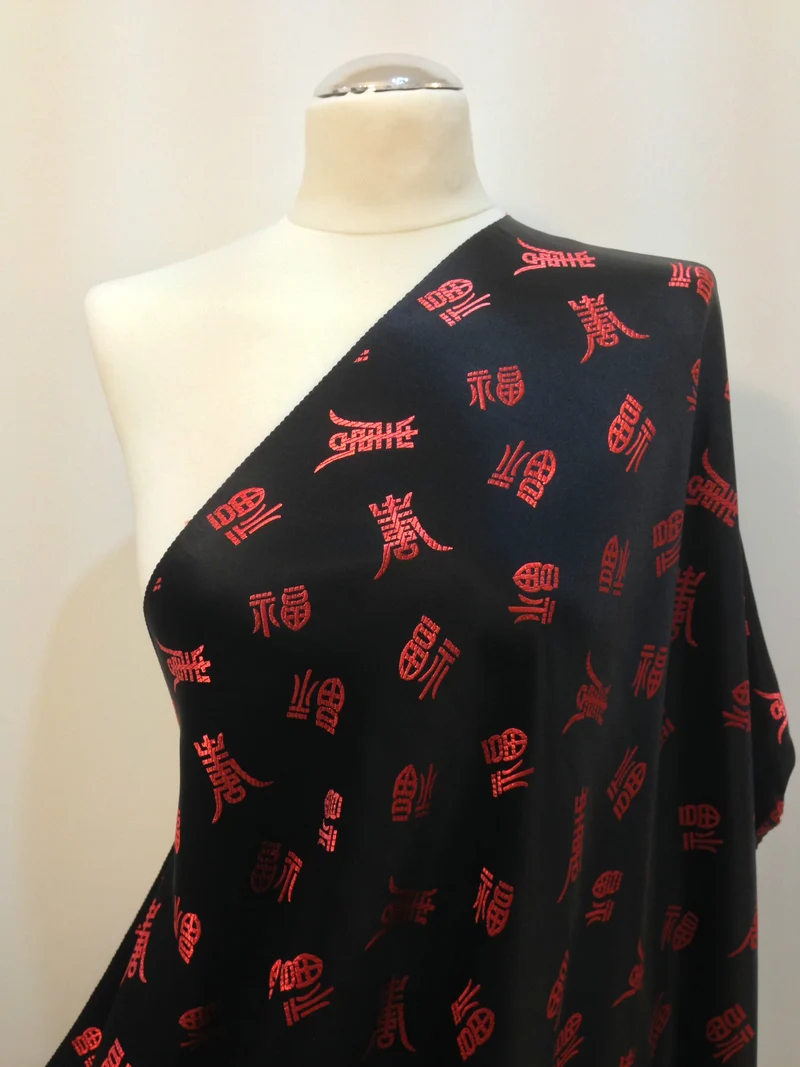 £7.99 Chinese Satin Brocade Fabric- Red Words on Black 45" Wide - M53-2 Mtex