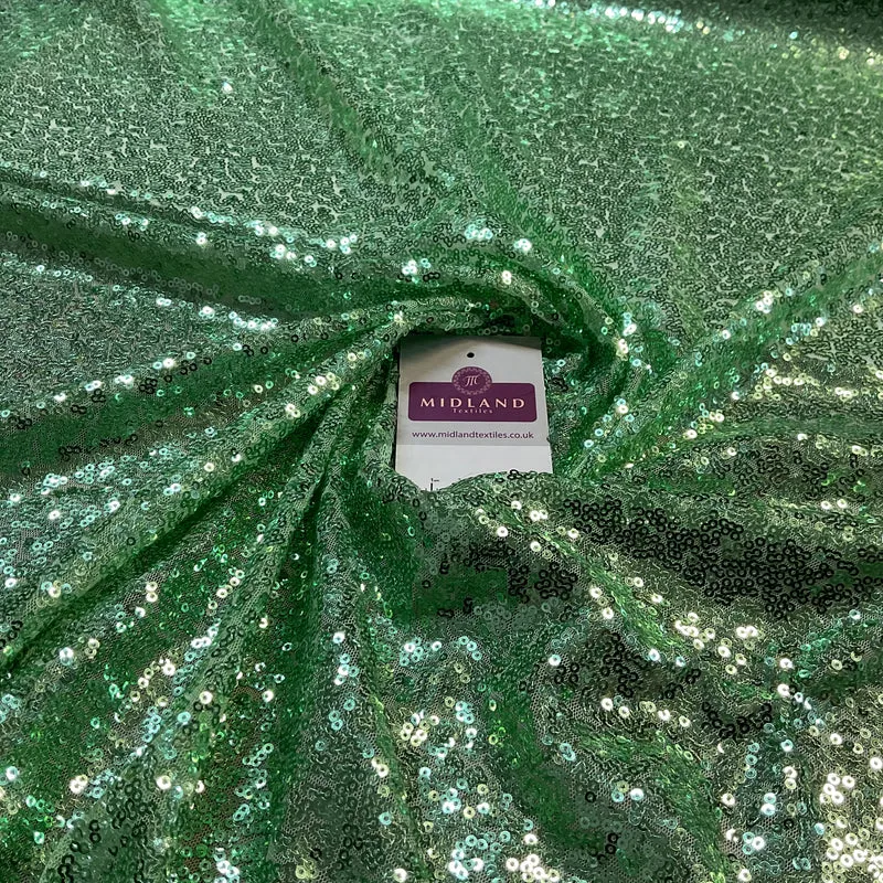 SENSATIONAL 3MM SEW ON ALL OVER SEQUINS ON NET FABRIC 50" WIDE DRESS FABRIC M1797 MTEX