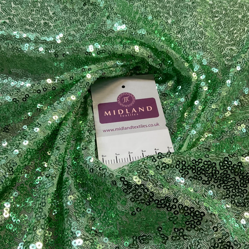 SENSATIONAL 3MM SEW ON ALL OVER SEQUINS ON NET FABRIC 50" WIDE DRESS FABRIC M1797 MTEX