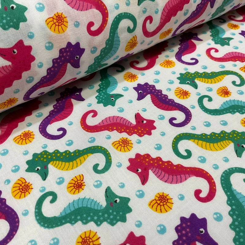 Colourful White Seahorses Poly cotton printed lightweight fabric M1624