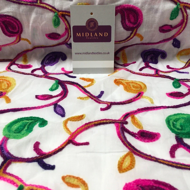 White Cotton with multicoloured wool embroidered dress fabric 54" Wide M1000